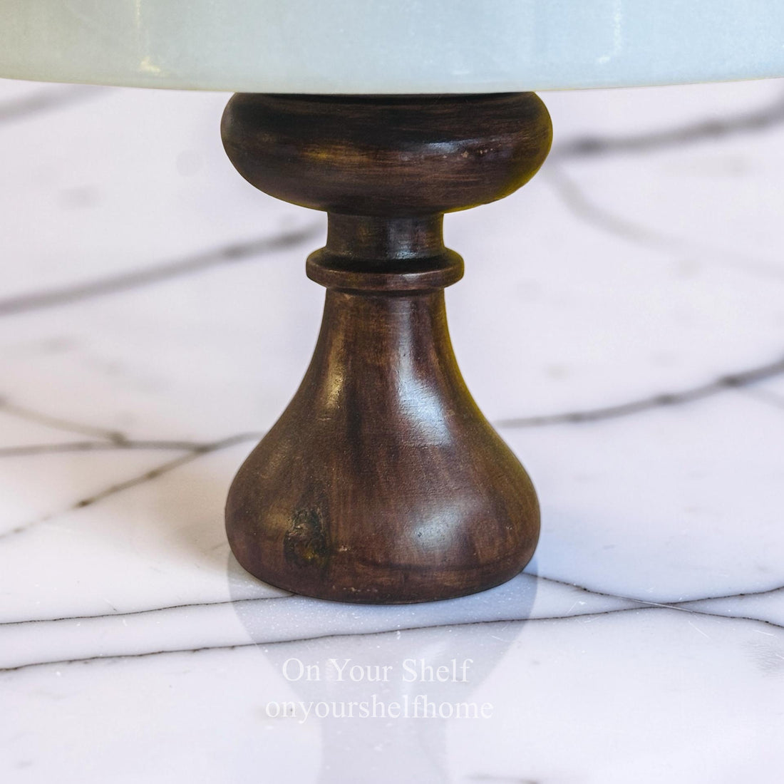 The Marble Muse Stand