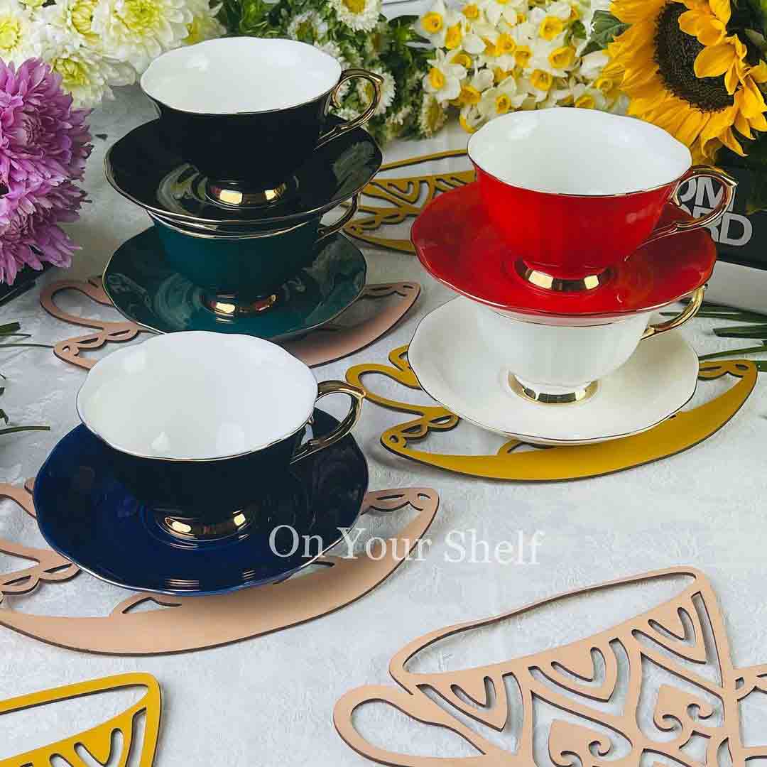 The Plain Black Teacups and Saucers